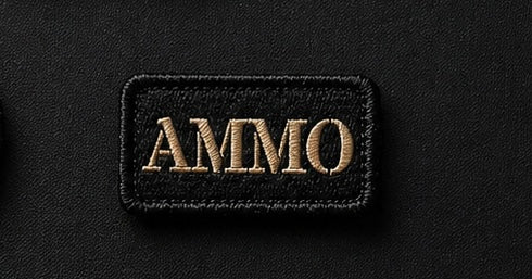 Black patch with 'AMMO' text on a black background